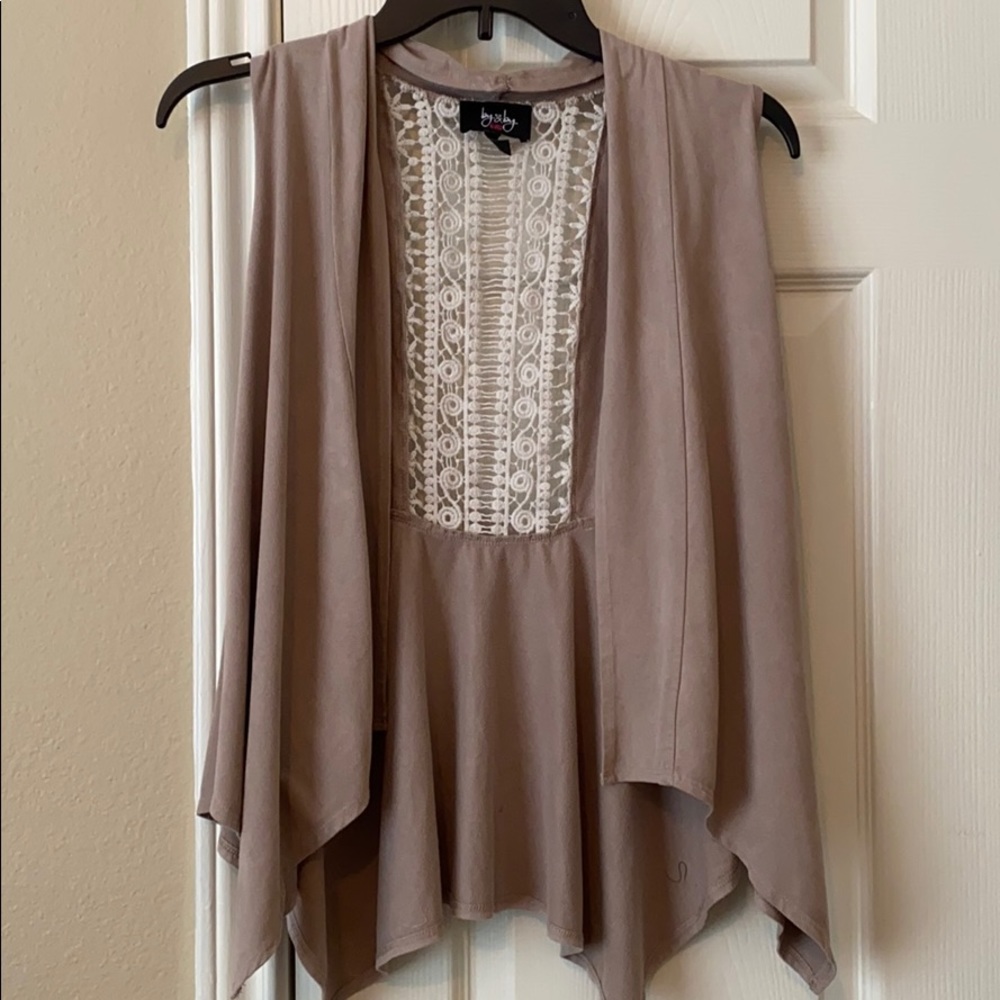 Beige and white cardigan.